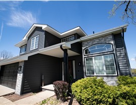 Seamless Gutters, Siding, Windows Project in Johnston, IA by Midwest Construction