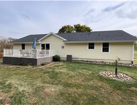 Decks, Seamless Gutters, Siding Project in Norwalk, IA by Midwest Construction