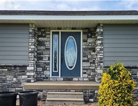 Manufactured Stone Siding, Siding, Windows Project in Osceola, IA by Midwest Construction