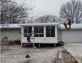 Seamless Gutters, Sunrooms Project in Ogden, IA by Midwest Construction