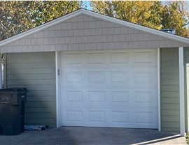 Seamless Gutters, Siding Project in Huxley, IA by Midwest Construction