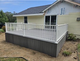 Decks, Seamless Gutters, Siding Project in Norwalk, IA by Midwest Construction