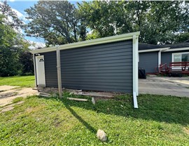 Seamless Gutters, Siding Project in Mason City, IA by Midwest Construction