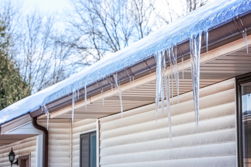 What Are Ice Dams, and How Can They Damage My Roof This February?