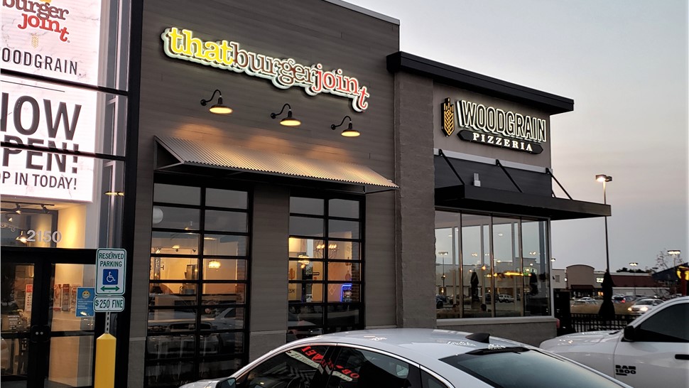 Awnings, Channel Letter Signs, Wayfinding/Post & Panel Signs Project in North Aurora, IL by Parvin-Clauss