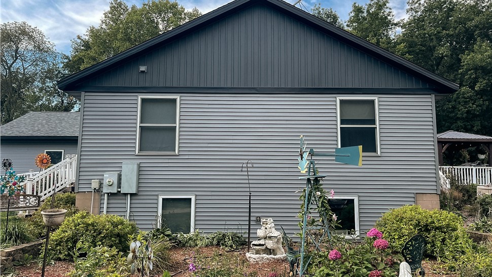 Siding Project in Utica, MN by Priority Construction Services