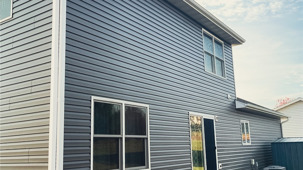 Gutters, Roofing, Siding Project in Byron, MN by Priority Construction Services