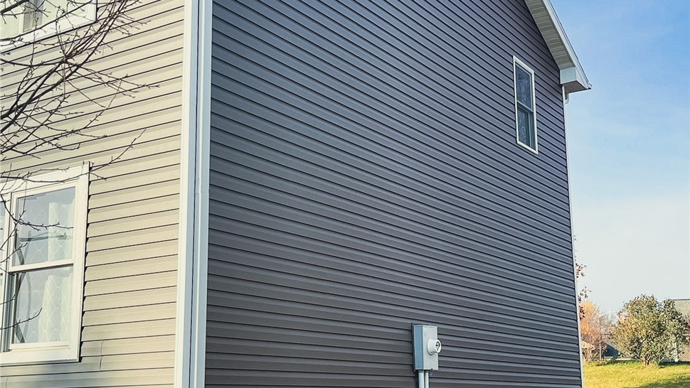 Gutters, Roofing, Siding Project in Byron, MN by Priority Construction Services