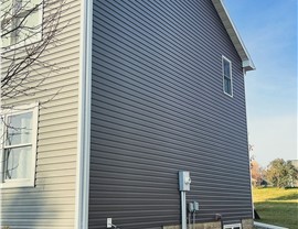 Gutters, Roofing, Siding Project in Byron, MN by Priority Construction Services