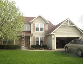  Fascia and Soffits,  Gutters,  Shutters, Mastic Siding Project in Oswego, IL by Pro Home 1