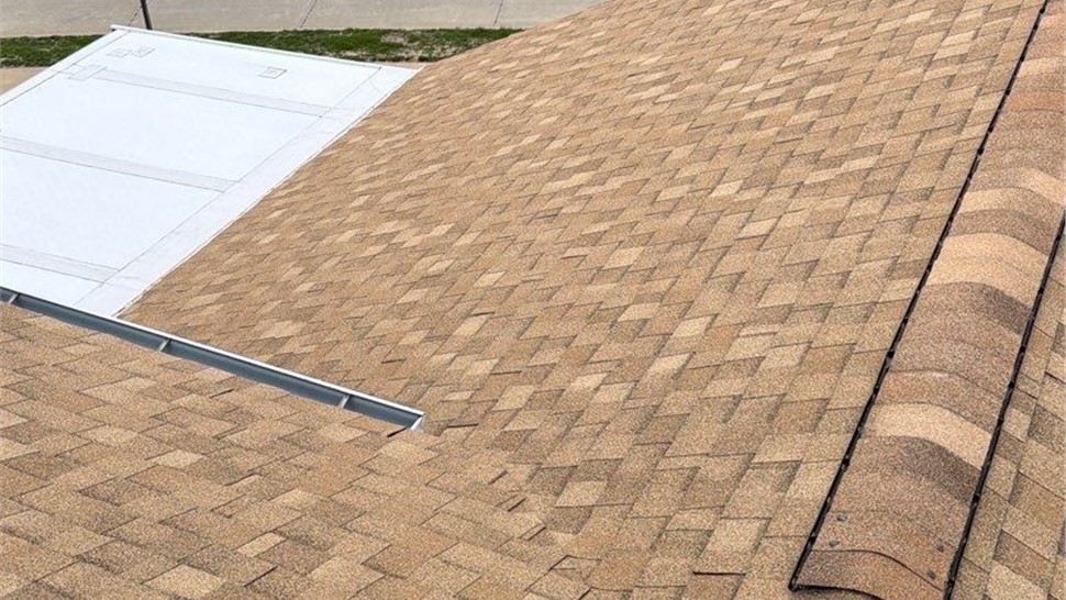 Gutters, Roofing, Siding Project in Iowa City, Iowa by Ram Roofing and Solar