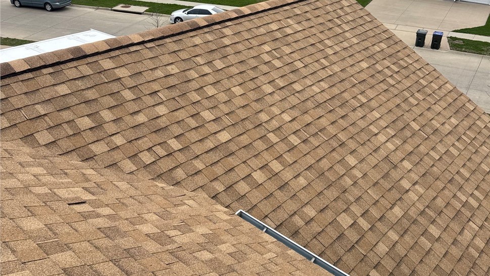 Gutters, Roofing, Siding Project in Iowa City, Iowa by Ram Roofing and Solar