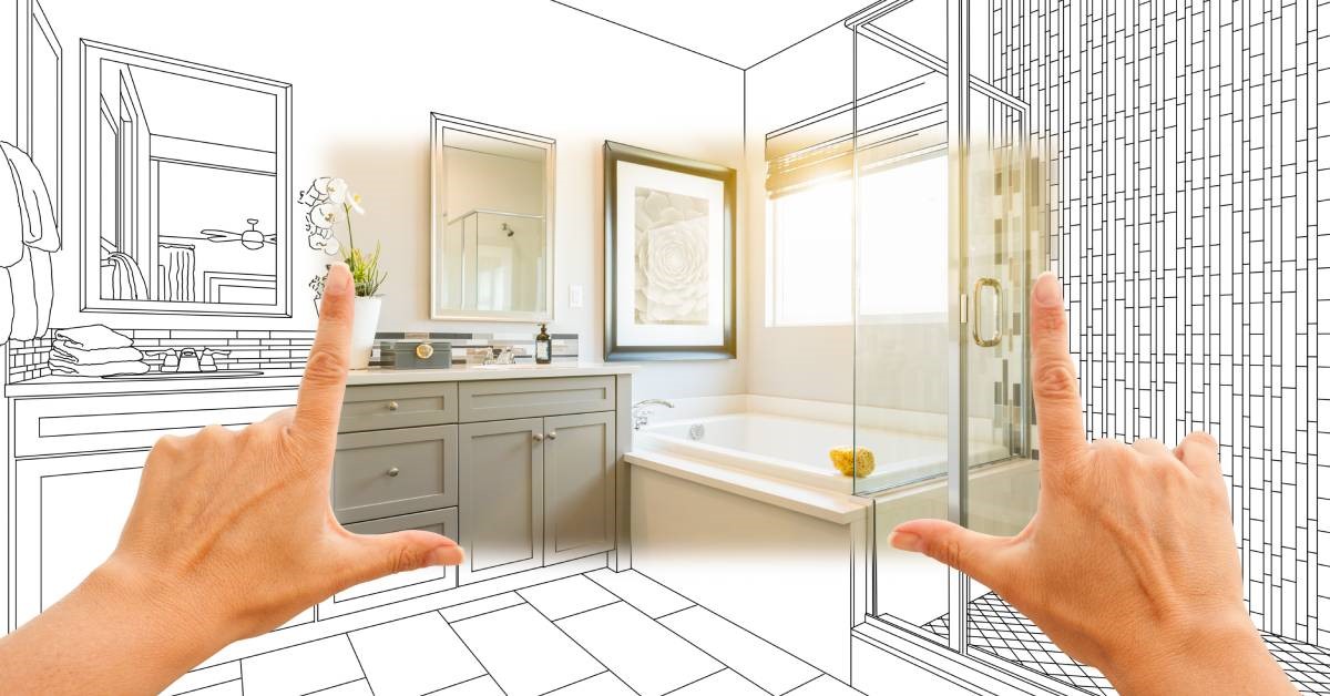 Two hands framing a superimposed image of a custom master bathroom remodel over a design drawing background.