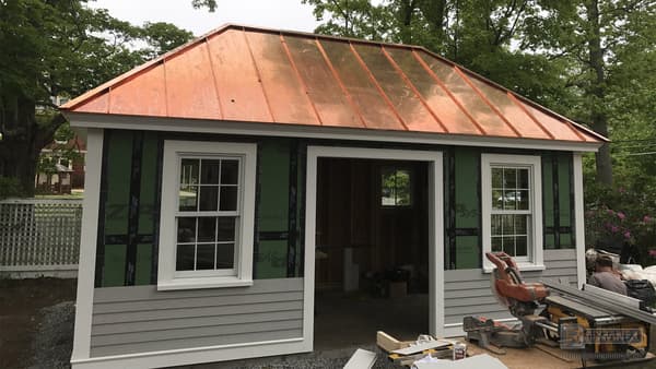 Copper metal roof added to accentuate an entrance