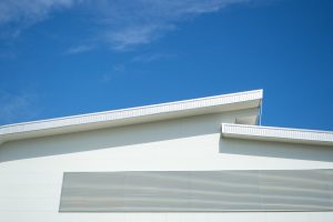 fascia of roof with blue sky