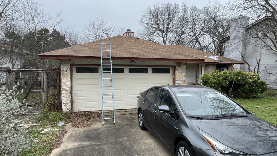 Before standing seam metal roof replacement on Austin TX home with asphalt shingles