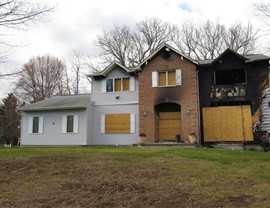 Tarp and Board Ups Photo 2