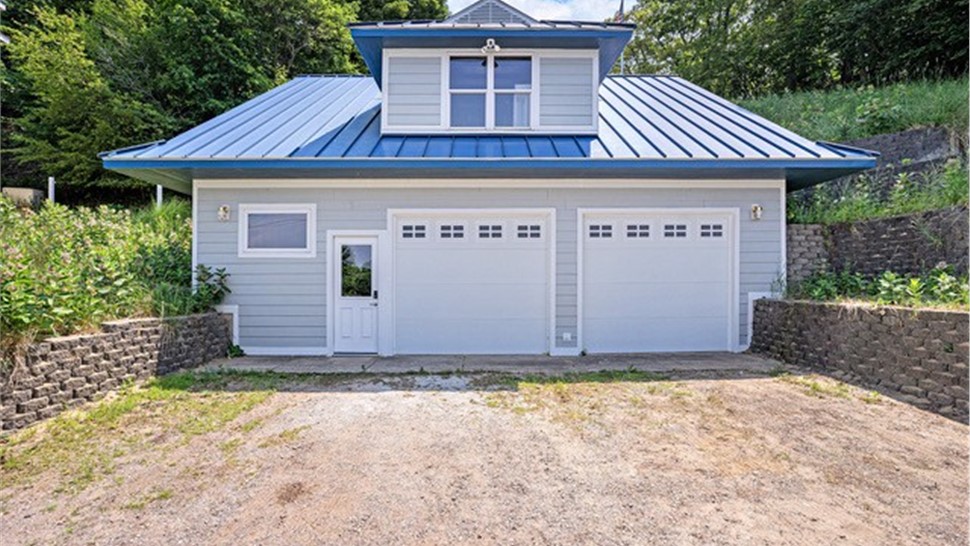  Gutters,  Siding, Decks Project in West Olive, MI by Sharp Construction