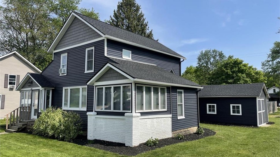 Roofing, Siding Project in Hopkins, Michigan by Sharp Construction