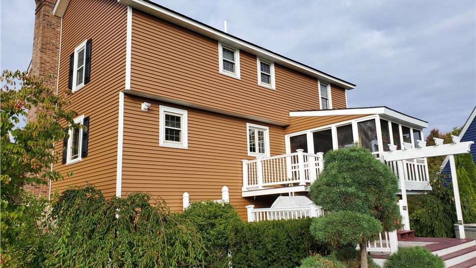 Siding Project in Manchester, New Hampshire by DeFrancesco Quality Roofing & Siding