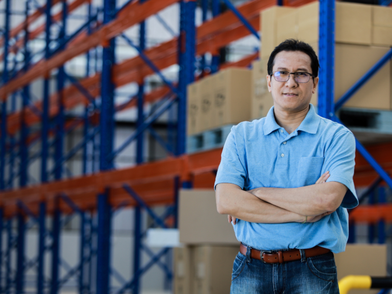 An image showing a warehouse owner who wants to replace their existing roof. 