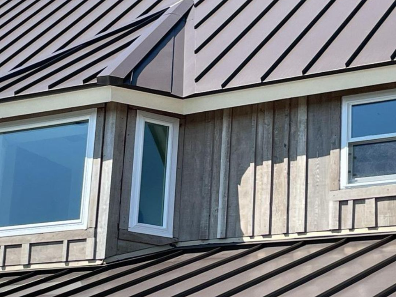 An image showing a standing seam metal roof installed by Spartan Roofing &amp; Siding in San Antonio, TX.