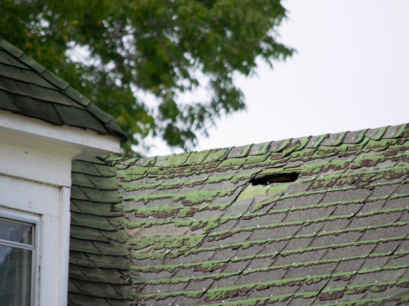 An image showing a roof in need of tile roof installation or replacement in San Antonio. 