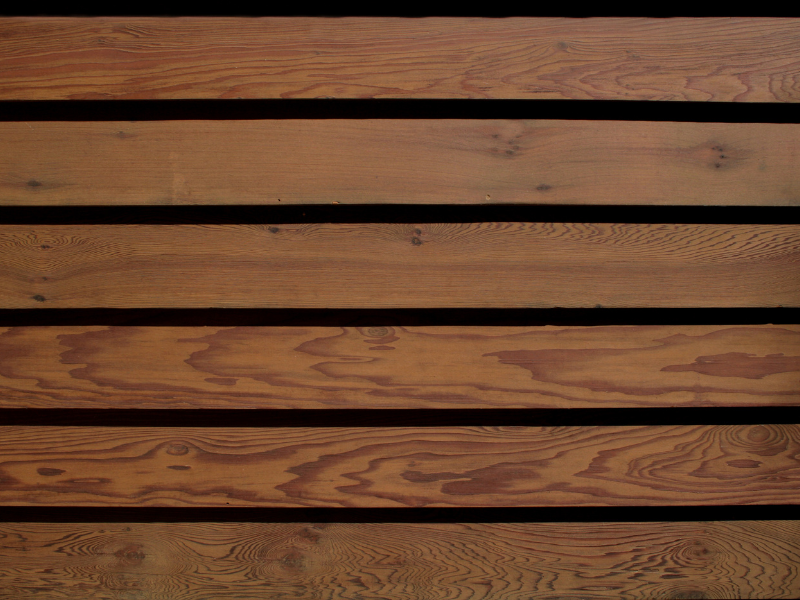An image showing properly maintained wood siding. 