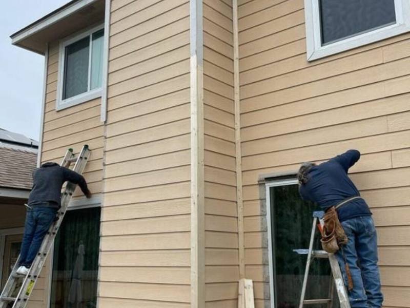 Image showing Spartan Roofing &amp; Siding installing James Hardie™ Fiber Cement Siding in San Antonio, TX.