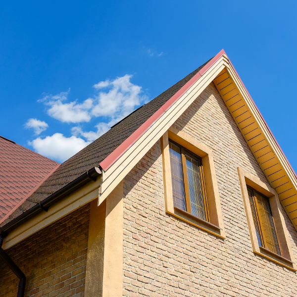 An image showing slate roofing on a custom-built home.