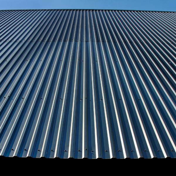 An image showing a metal roof reflecting sunlight.