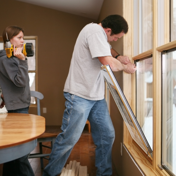 An image of energy-efficient windows being installed in a San Antonio home.