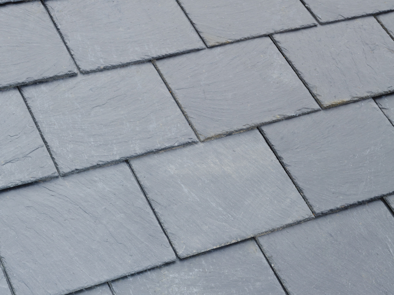 An image showing a slate roof offering amazing benefits for new homeowners in San Antonio, TX. 
