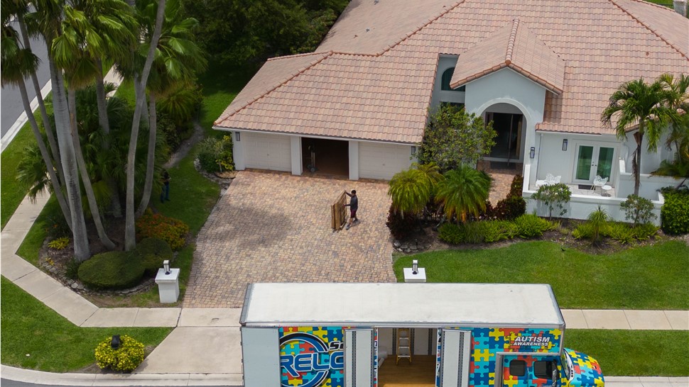 Aerial shot of Solomon & Sons parked for South Florda household move.