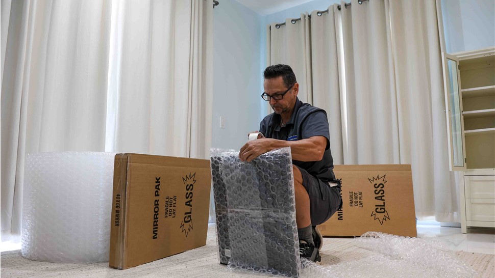 Careful home moving packing from Solomon & Sons employee