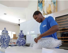 Fort Lauderdale Moving company packing fine china