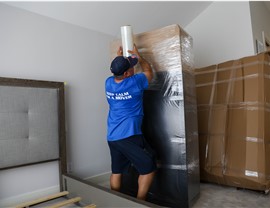 Packing furniture by Miami household movers
