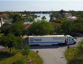 Finishing a cross-country move in a neighborhood.
