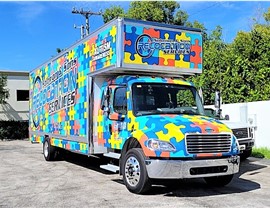 Autism Awareness Moving Truck ready for commercial relocation service