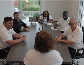 Solomon & Sons team in meeting