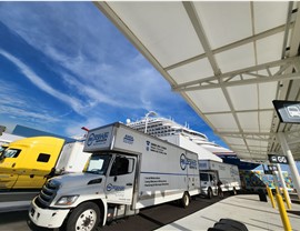 Truck parked at ship port for international moving