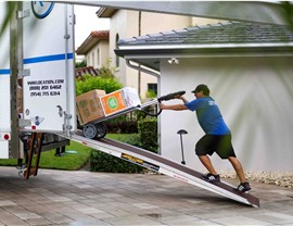 Miami movers loading moving truck.