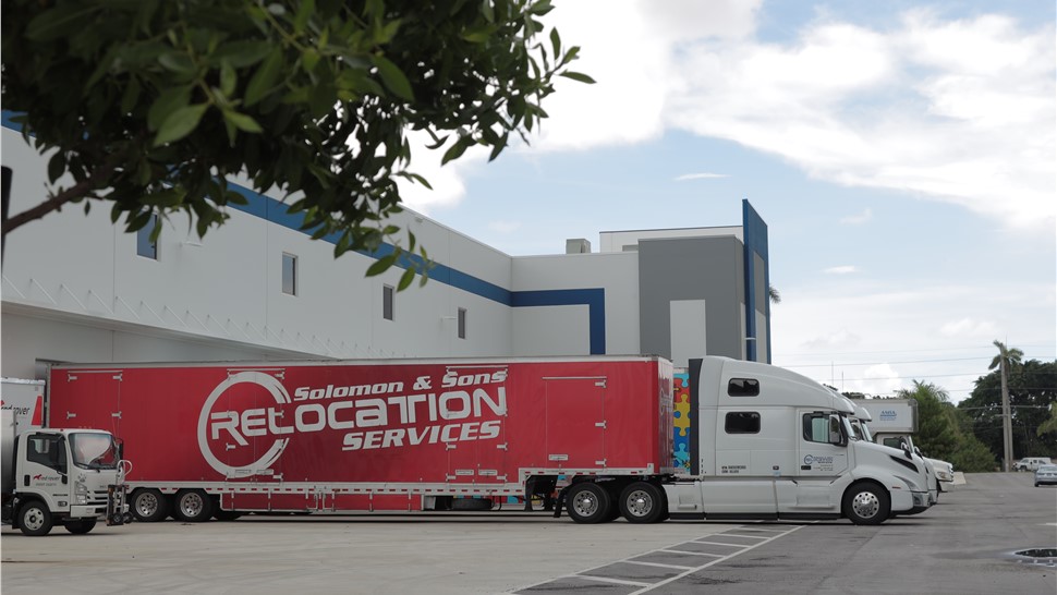 Solomon & Sons moving truck outside the Dania, Florida warehouse before loading.