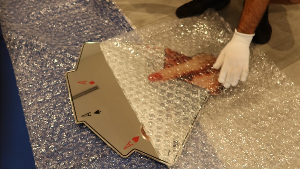Fragile item being protected with bubble wrap by Miami movers