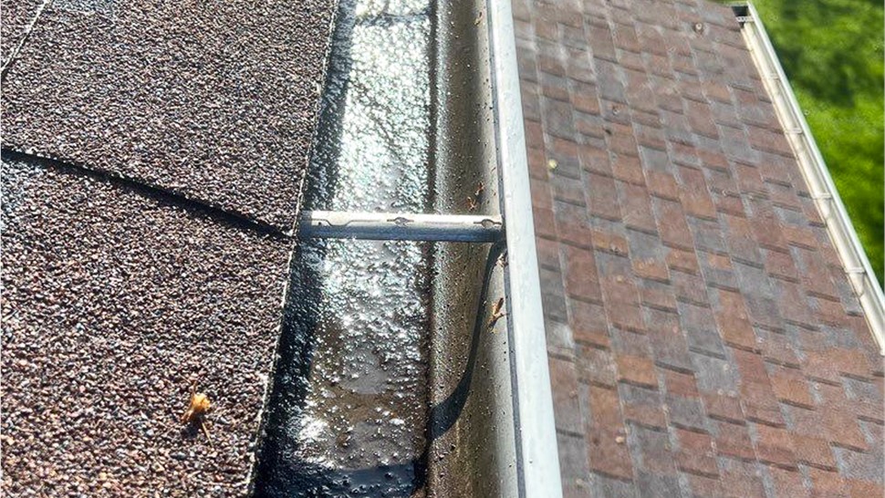 Gutters Project in Naperville, IL by Stan's Roofing & Siding