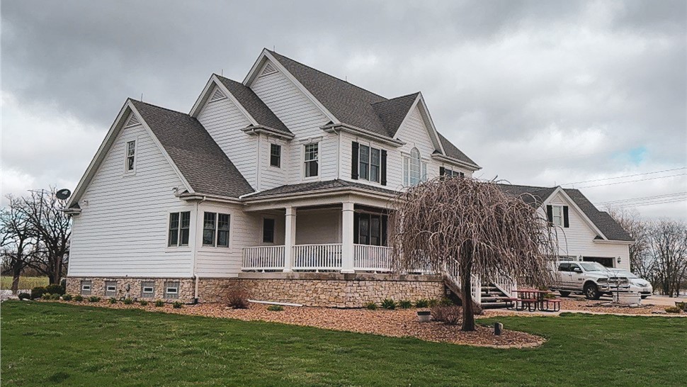 Decks, Gutters, Metal Roofing, Siding, Soffit and Fascia Project in Manteno, IL by Stan's Roofing & Siding