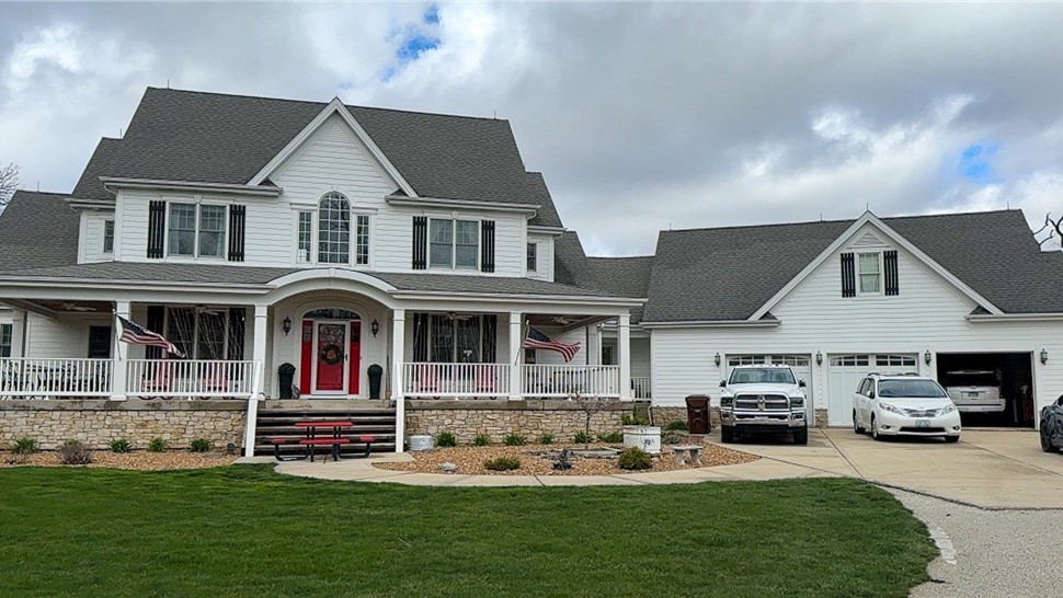 Decks, Gutters, Metal Roofing, Siding, Soffit and Fascia Project in Manteno, IL by Stan's Roofing & Siding
