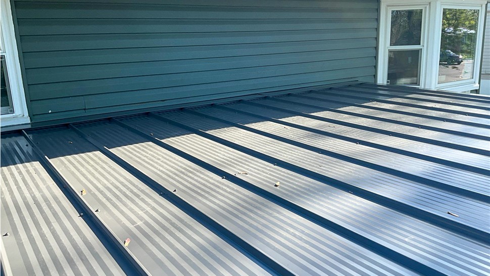 Gutters, Metal Roofing, Soffit and Fascia Project in Romeoville, IL by Stan's Roofing & Siding