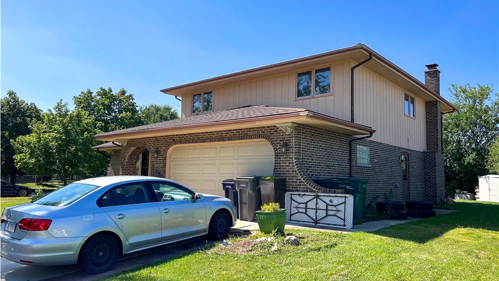 Doors, Gutters, Siding, Soffit and Fascia Project in Orland Park, IL by Stan's Roofing & Siding
