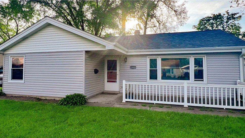 Roofing, Siding, Gutters, Soffit and Fascia Project in Worth, IL by Stan's Roofing & Siding